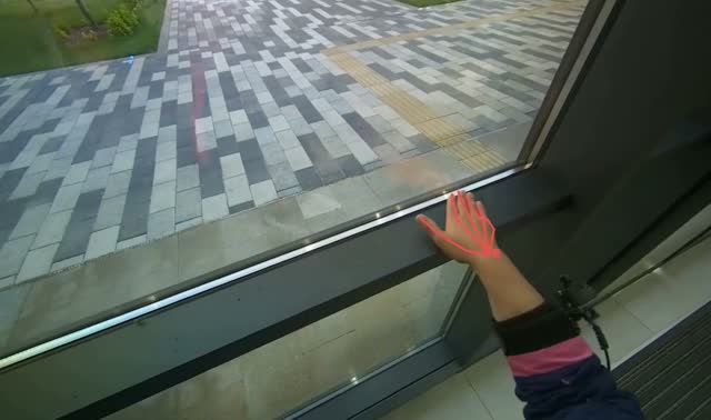 Mopping floor near glass doors: egocentric robotics sample
