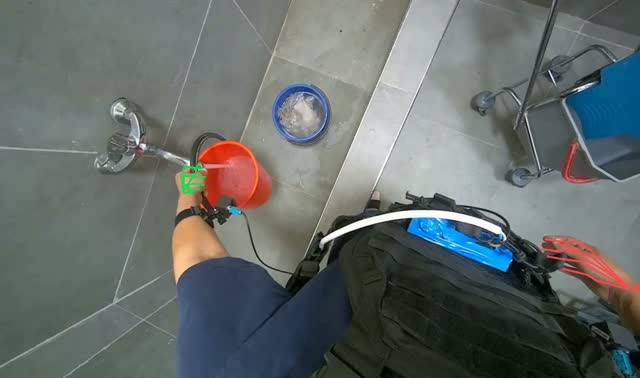 Filling bucket with water: egocentric robotics sample