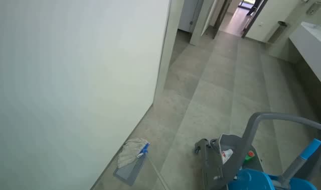 Mopping restroom floor: egocentric robotics sample