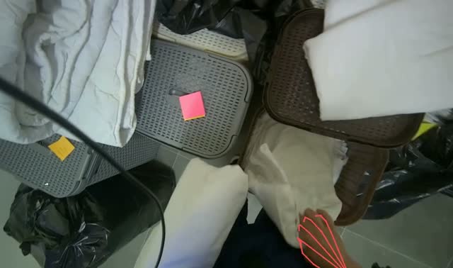 Folding and organizing linens into baskets: egocentric robotics sample