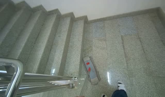 Mopping stairwell floor: egocentric robotics sample