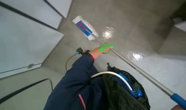 Mopping bathroom floor: egocentric robotics sample
