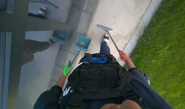 Sweeping debris along glass wall: egocentric robotics sample