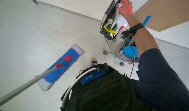 Preparing mop for cleaning: egocentric robotics sample