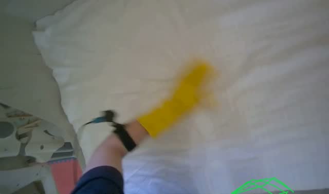 Adjusting pillows on beds: egocentric robotics sample