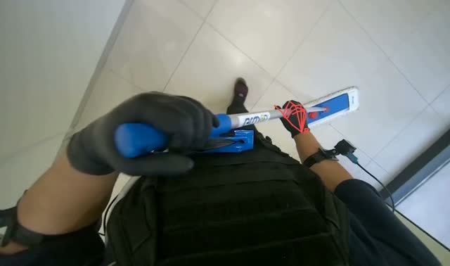 Mopping floor with flat mop: egocentric robotics sample