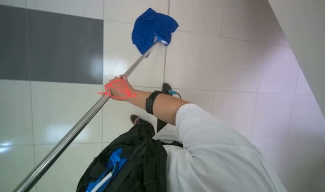 Mopping floor with string mop: egocentric robotics sample