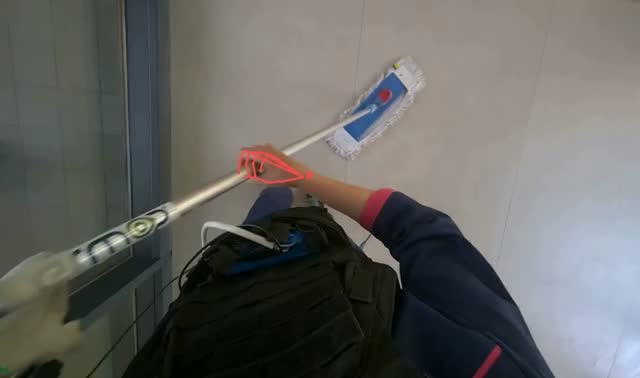 Mopping floor with mop: egocentric robotics sample