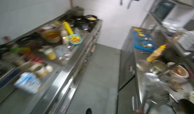 Stirring ingredients in pan: egocentric robotics sample