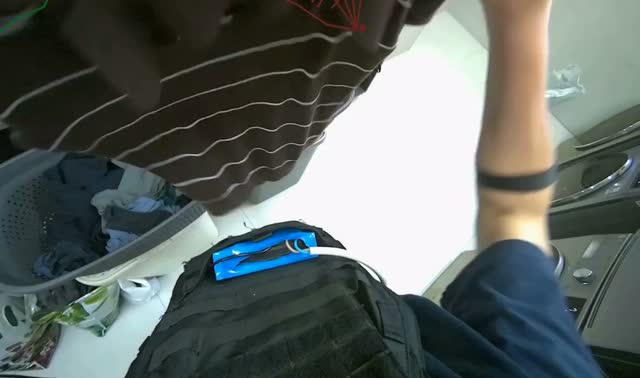 Folding clothes into basket: egocentric robotics sample