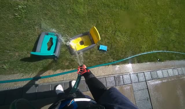 Spraying water on recycling bins: egocentric robotics sample