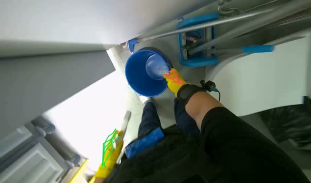 Removing cleaning supplies from restroom cabin: egocentric robotics sample