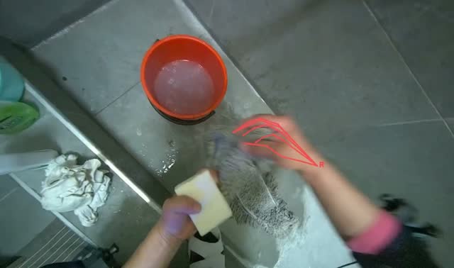 Cleaning flat mop head with soap: egocentric robotics sample