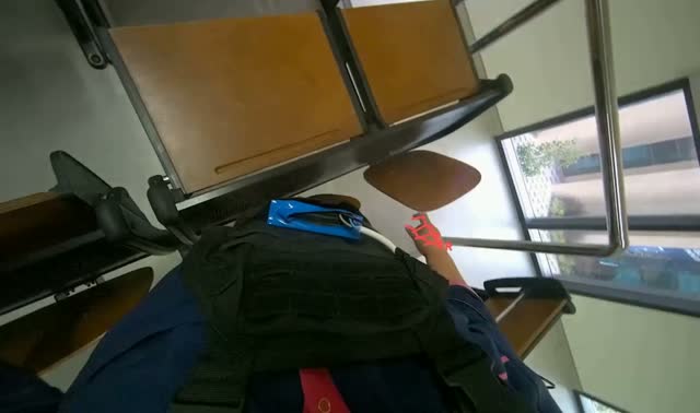 Adjusting lecture hall desks: egocentric robotics sample