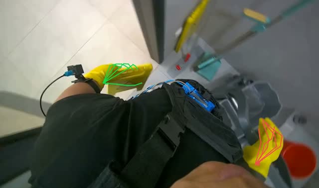 Storing cleaning tools and placing safety sign: egocentric robotics sample