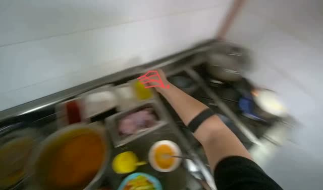Cooking and stirring food in pot: egocentric robotics sample