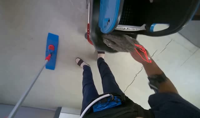 Rinsing and wringing mop head: egocentric robotics sample