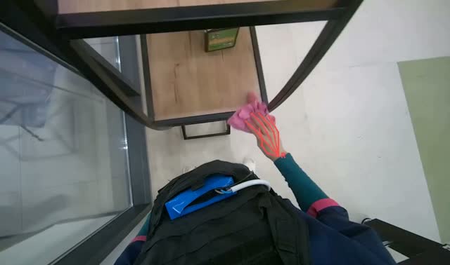 Wiping wooden shelves and frame: egocentric robotics sample