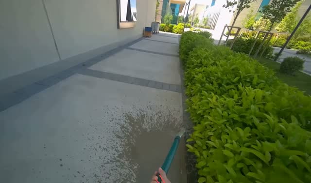 Spraying water on sidewalk: egocentric robotics sample