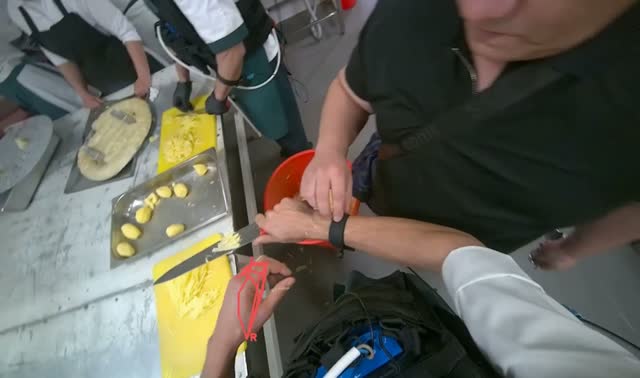 Transferring sliced potatoes to bowl: egocentric robotics sample