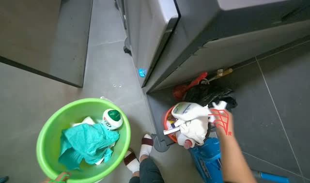 Collecting cleaning supplies into bucket: egocentric robotics sample