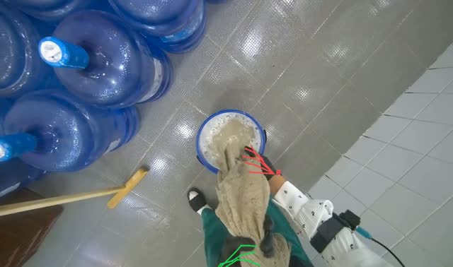 Wringing and preparing mop: egocentric robotics sample