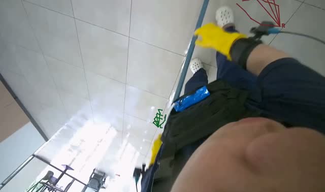 Cleaning floor with mop: egocentric robotics sample