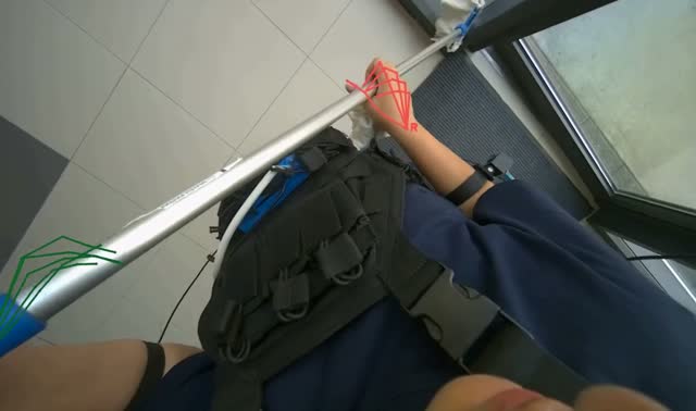 Cleaning lower glass door with long-handled tool: egocentric robotics sample