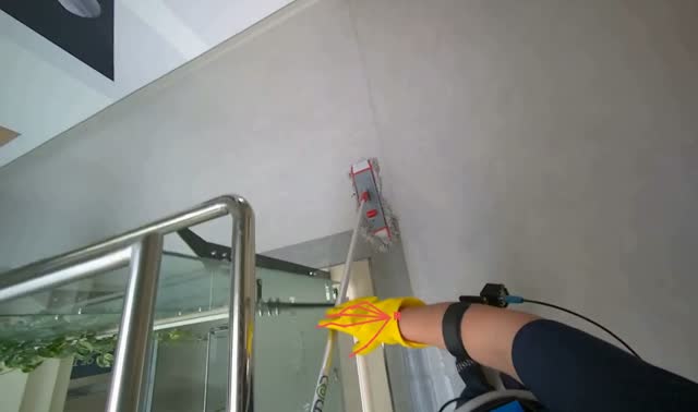 Mopping hallway floor: egocentric robotics sample