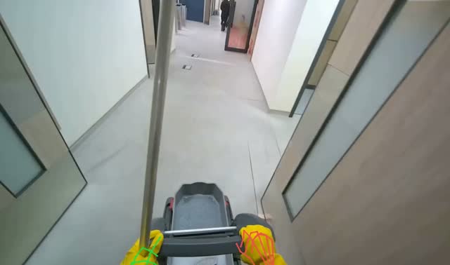 Mopping hallway floor: egocentric robotics sample