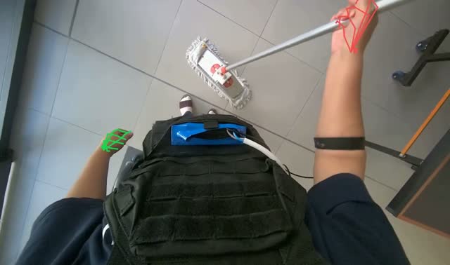 Mopping tiled floor with flat mop: egocentric robotics sample