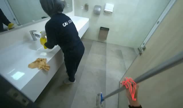 Mopping bathroom and changing room floors: egocentric robotics sample