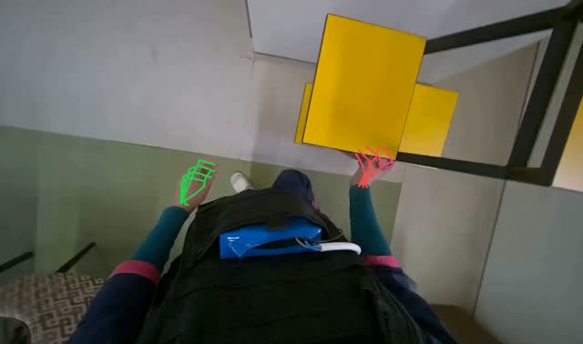 Wiping yellow display shelf: egocentric robotics sample