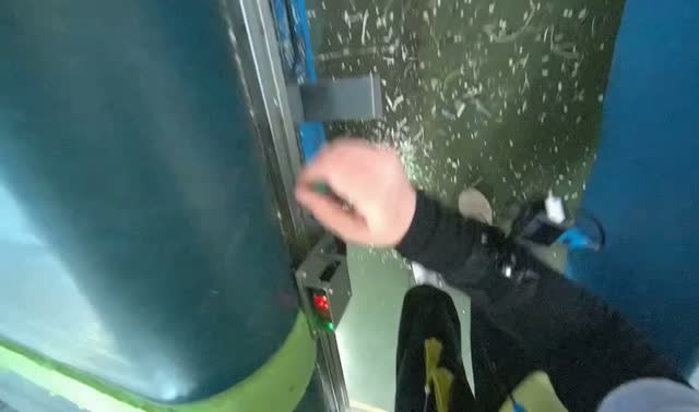Cleaning debris from machine: egocentric robotics sample