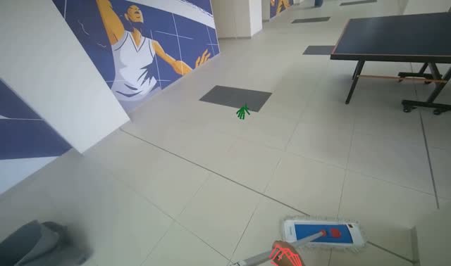Mopping floor with flat mop: egocentric robotics sample