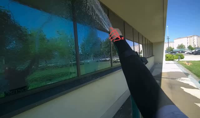 Spraying water on building windows: egocentric robotics sample
