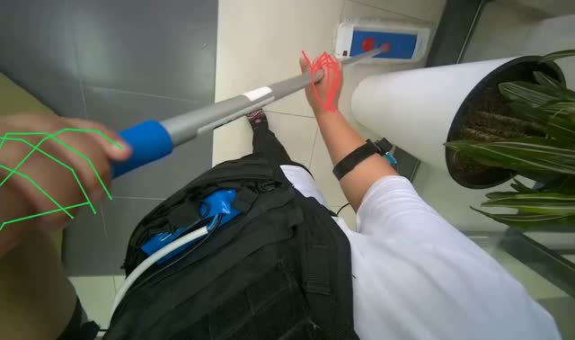 Mopping floor with flat mop: egocentric robotics sample