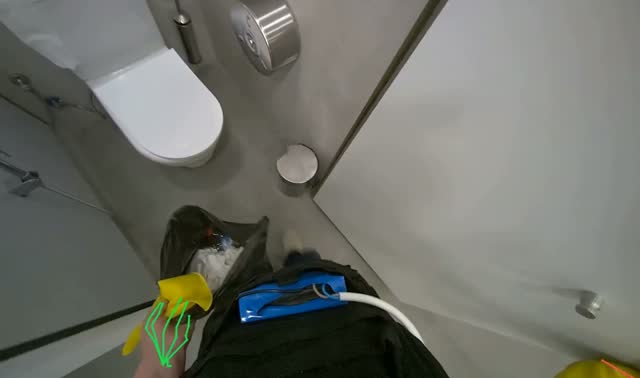 Emptying trash from toilet stalls: egocentric robotics sample