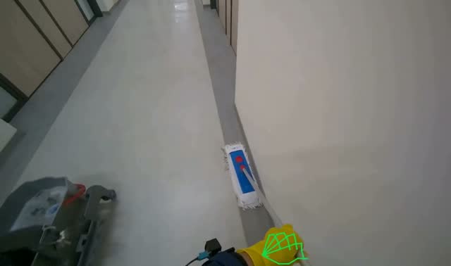 Mopping hallway floor: egocentric robotics sample