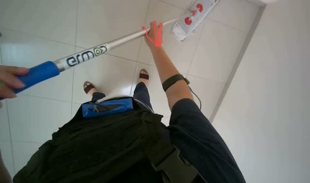 Mopping floor with flat mop: egocentric robotics sample